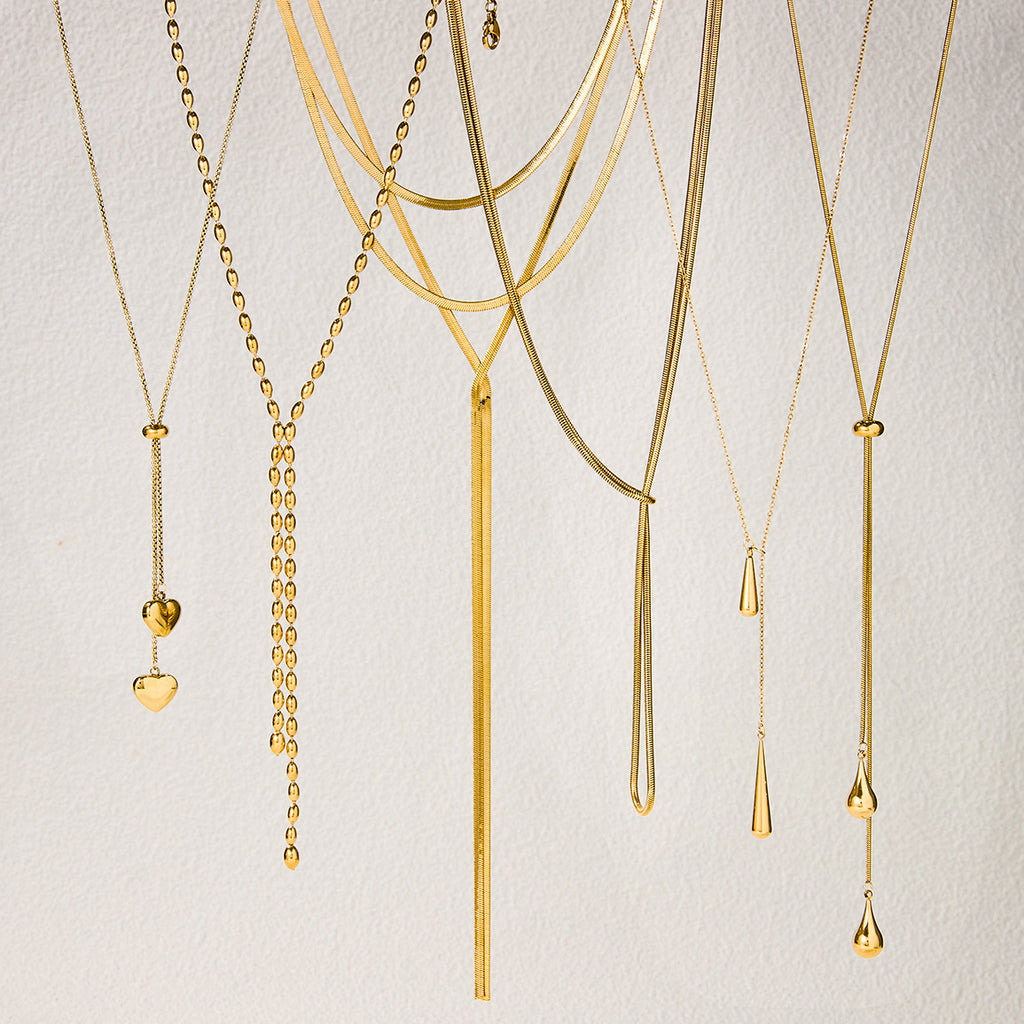 Layered Gold Statement Necklaces Set - Y2K Inspired Dainty Chains with Heart, Teardrop & Geometric Pendants for Trendy Women's Fashion