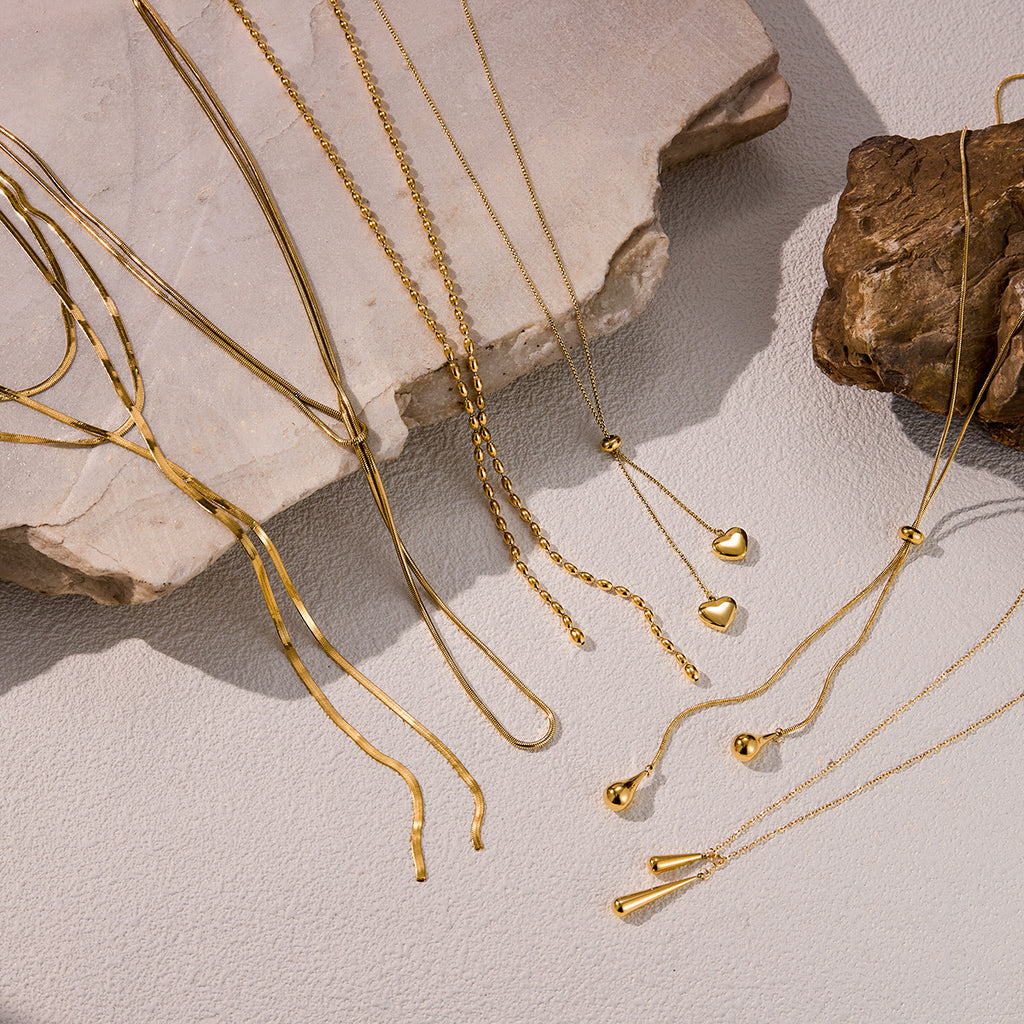 Layered Gold Statement Necklaces Set - Y2K Inspired Dainty Chains with Heart, Teardrop & Geometric Pendants for Trendy Women's Fashion