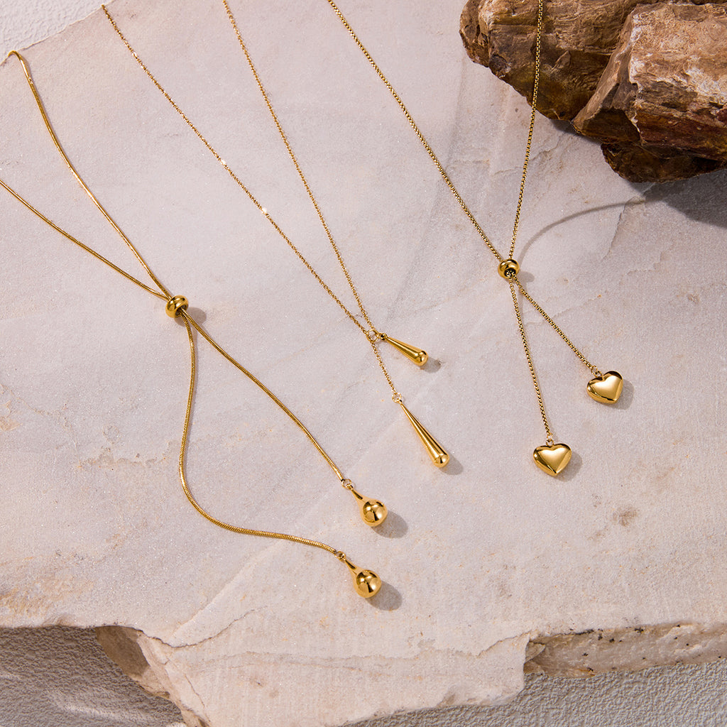 Layered Gold Statement Necklaces Set - Y2K Inspired Dainty Chains with Heart, Teardrop & Geometric Pendants for Trendy Women's Fashion