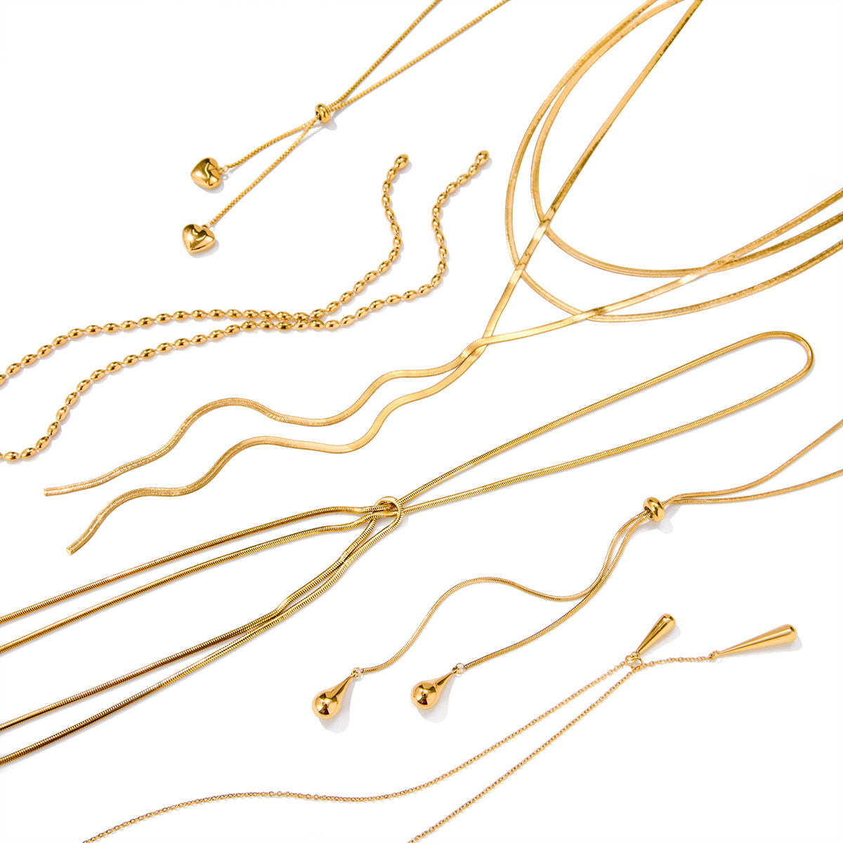 Layered Gold Statement Necklaces Set - Y2K Inspired Dainty Chains with Heart, Teardrop & Geometric Pendants for Trendy Women's Fashion