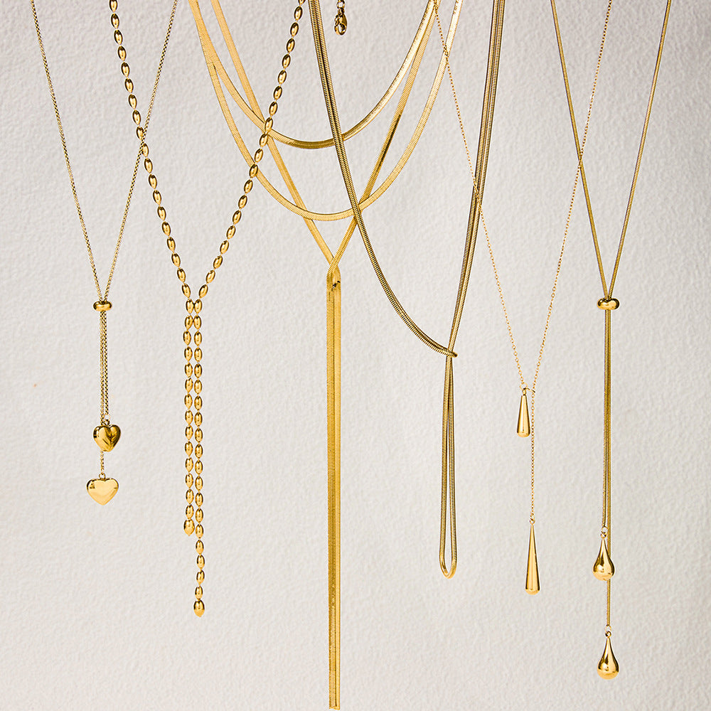 Layered Gold Statement Necklaces Set - Y2K Inspired Dainty Chains with Heart, Teardrop & Geometric Pendants for Trendy Women's Fashion